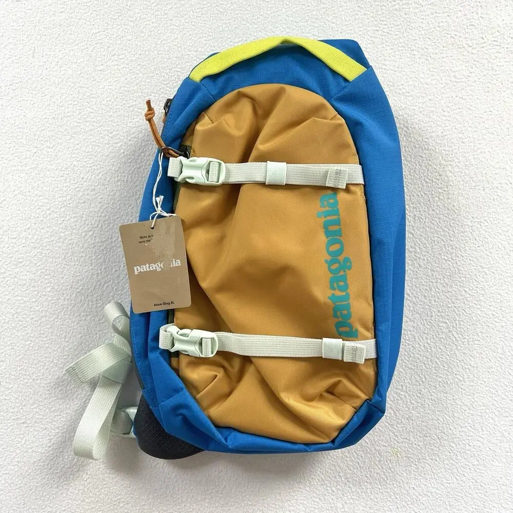 NWT Patagonia PWVL Patchwork Vessel Blue Gold Atom Sling 8L Backpack Bag 48262
